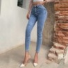 Sexy skinny jeansy - wysoki stan - z kieszeniami / z guzikami - elastyczneSpodnie