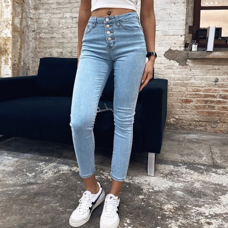 Skinny jeansy z wysokim stanem - z guzikami z przodu - elastyczneSpodnie