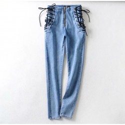 Seksowne jeansy slim - wysoki stan - z zamkiem / wiązaniem po bokachSpodnie