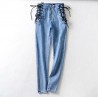 Seksowne jeansy slim - wysoki stan - z zamkiem / wiązaniem po bokachSpodnie