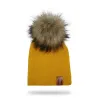 Knitted beanie with pom pom / leather label - unisex - for kids / adultsHats & caps