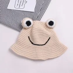 Warm knitted hat - bucket style - with toad's eyesHats & caps