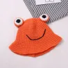 Warm knitted hat - bucket style - with toad's eyesHats & caps