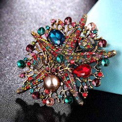 Kryształowa rozgwiazda z perłą - broszka vintageBroszki