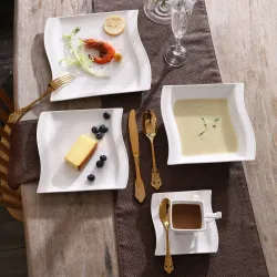 Elegancka zastawa stołowa - biały porcelanowy zestaw obiadowy - filiżanki - spodki - talerzeSztućców