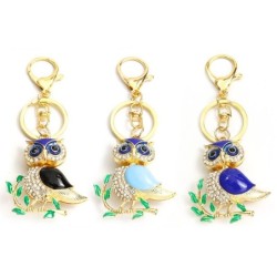 Golden crystal owl - green leaves - keychainKeyrings