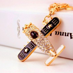 Crystal airplane - gold keychainKeyrings