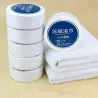 Compressed soft travel towel - cottonTextile